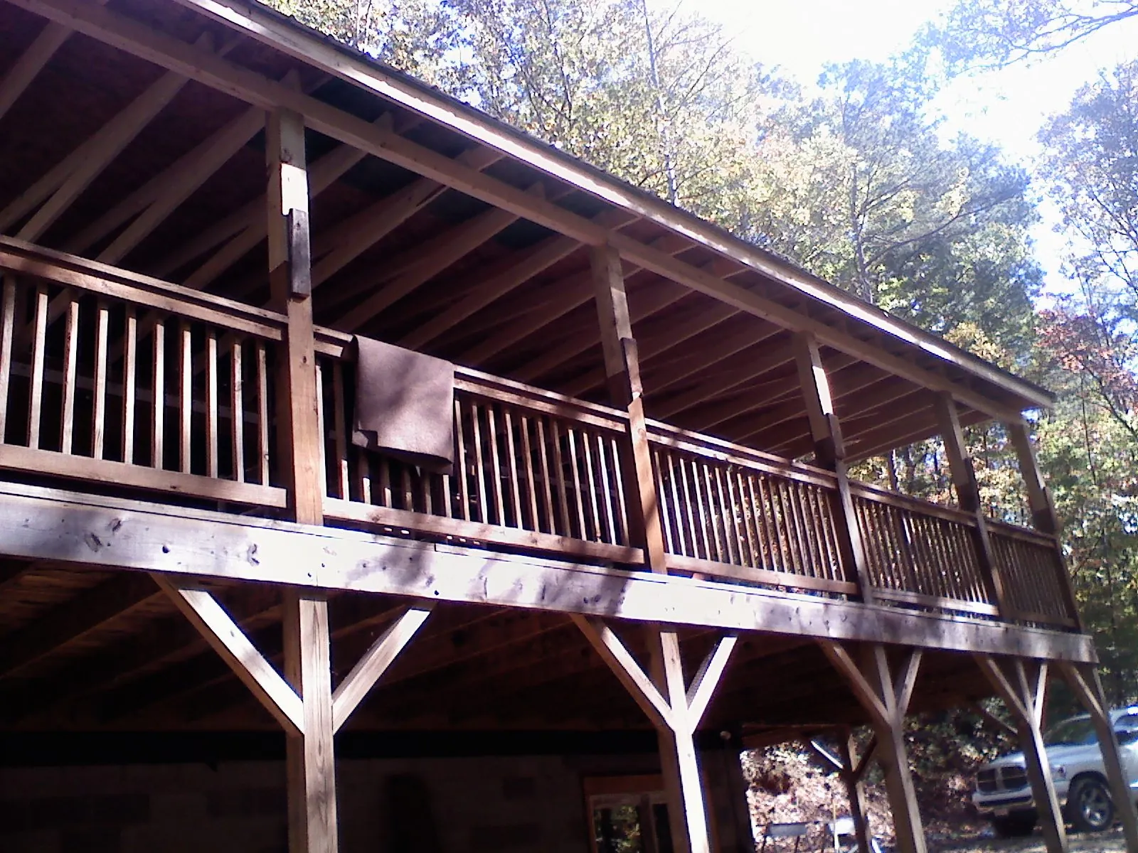 Timber framing under a new elevated porch and deck — Roof Leak Repair in Elkridge by Roofing Brothers
